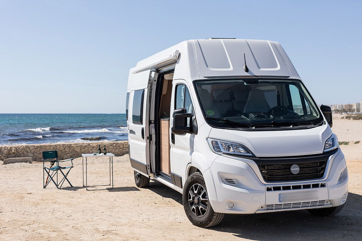 Campervan parked in the beach